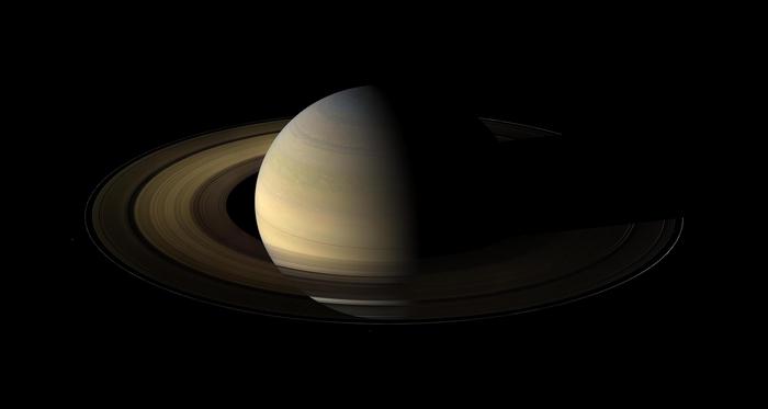 Saturn's Fast Rotation Reshapes Its Protective Shield
